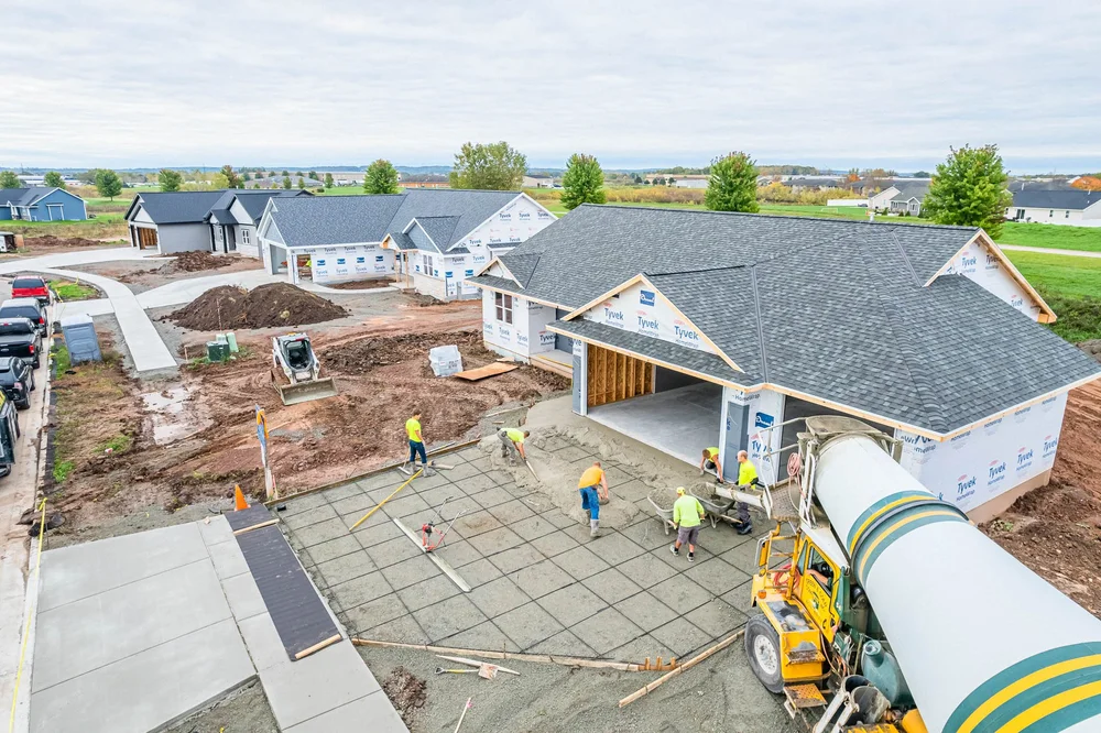 RG Hendricks crew finishing a new-construction garage slab in Green Bay, Wisconsin